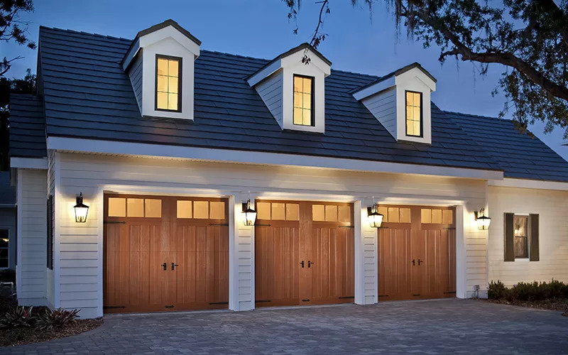 Home with three Canyon Ridge carriage house style garage doors