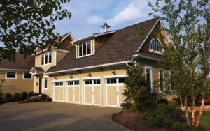 Thumbnail of Home with four premium Coachman Collection garage doors